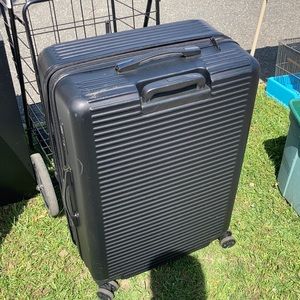 Calpak Suitcase used black good condition
